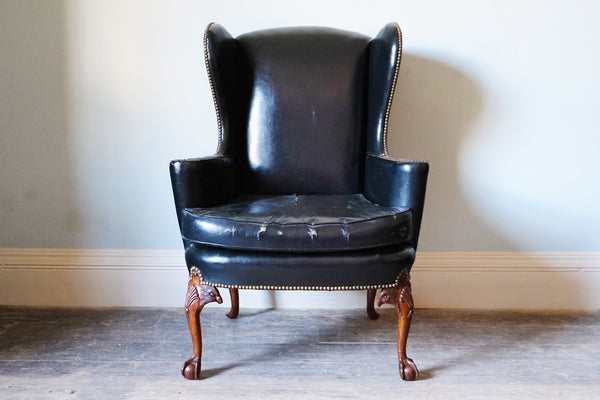 Black Leather-Upholstered Wingback Armchair with Ball & Claw Feet