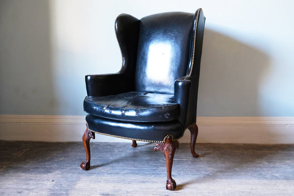 Black Leather-Upholstered Wingback Armchair with Ball & Claw Feet