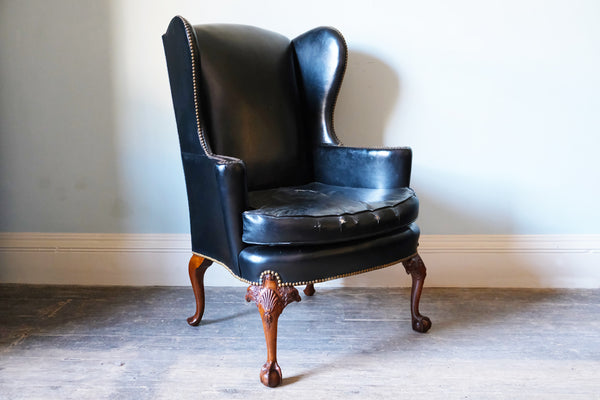 Black Leather-Upholstered Wingback Armchair with Ball & Claw Feet
