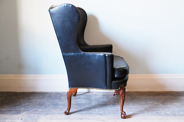 Black Leather-Upholstered Wingback Armchair with Ball & Claw Feet