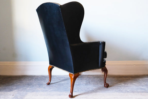 Black Leather-Upholstered Wingback Armchair with Ball & Claw Feet